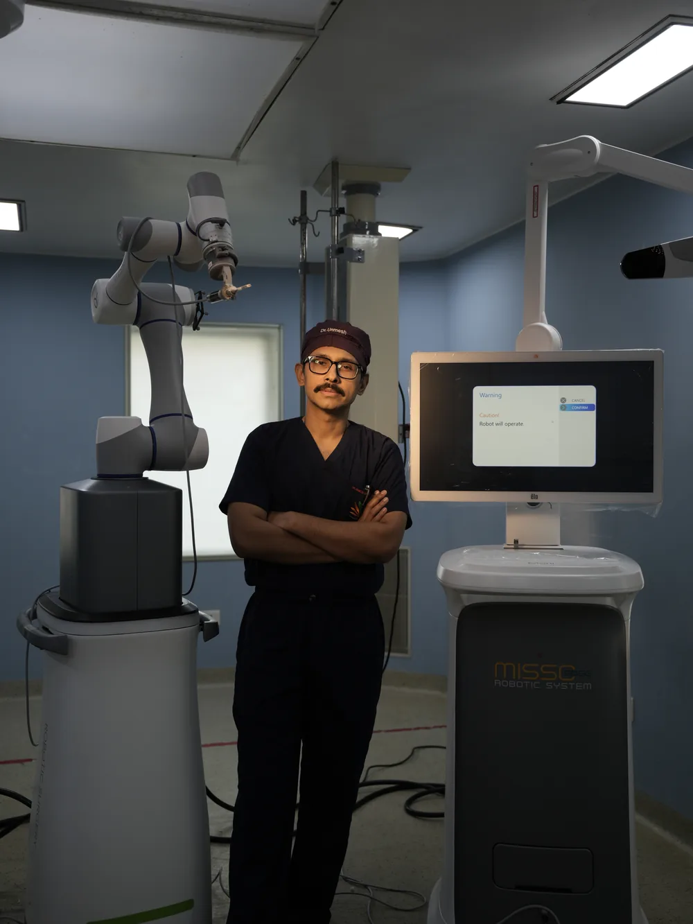 Dr. Unmesh Chakraverty with the MISSO robotic system